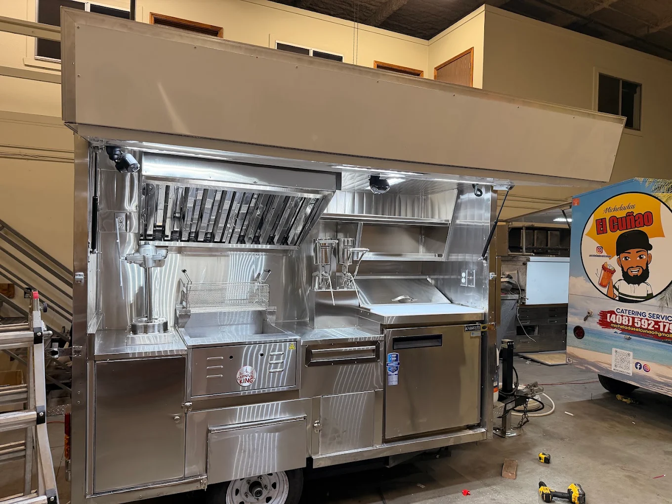 Stainless food cart interior with equipment