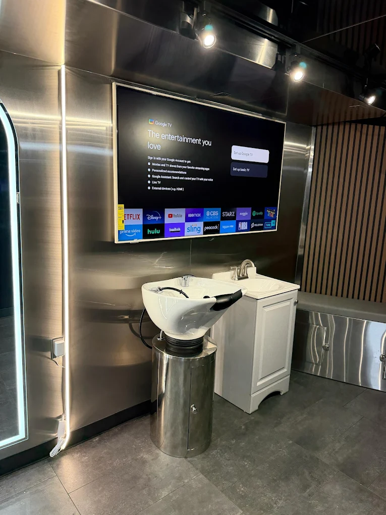 Premium mobile salon with shampoo bowl and TV