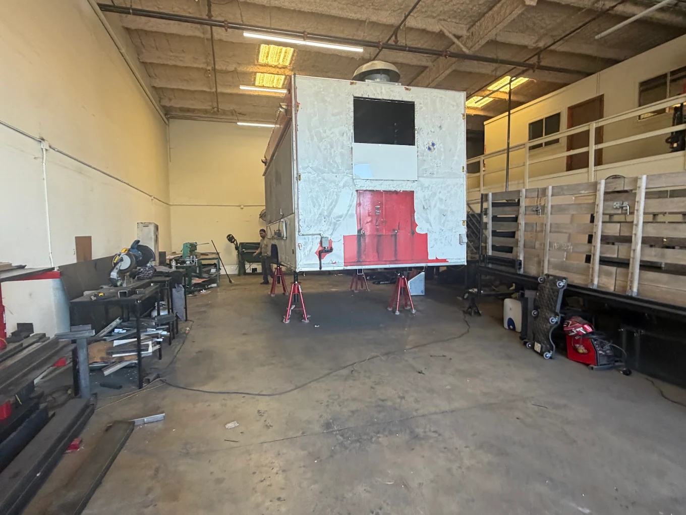 Truck body on jack stands for rebuild